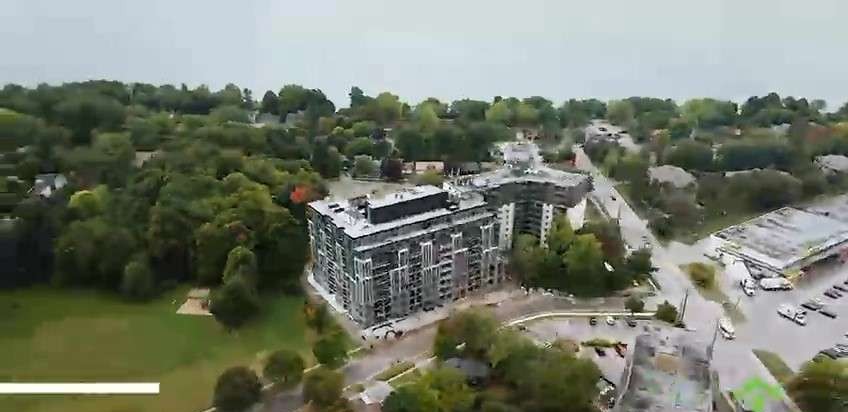 Aerial view of the 37 Johnson Street building among the trees, Barrie